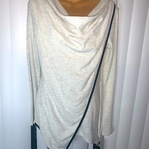 Drop neck terry cloth style wrap top leather trim.